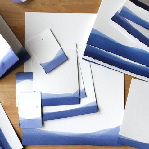 a collection of blue and white stationery.