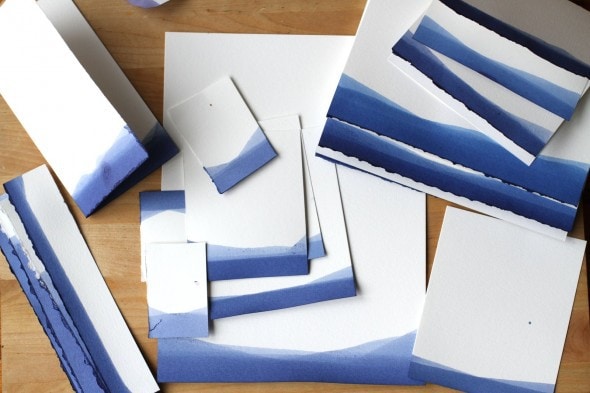 a collection of blue and white stationery.