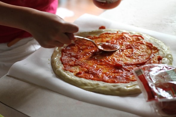 Lisey making pizza