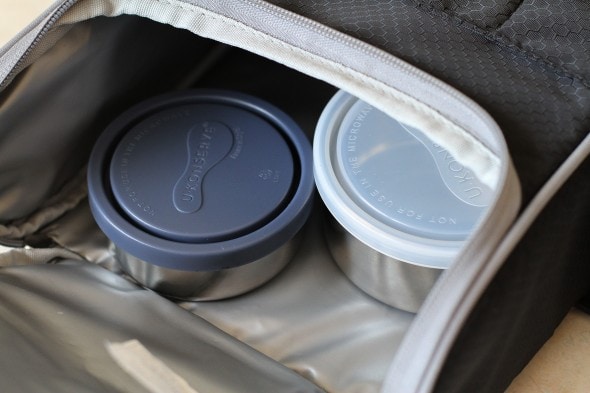 Two stainless steel containers in a lunch bag.