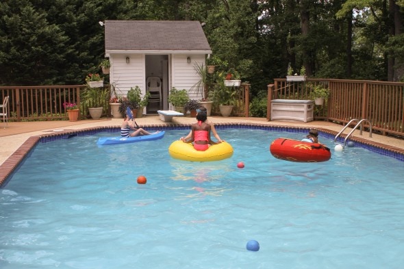 Kids in a swimming pool.