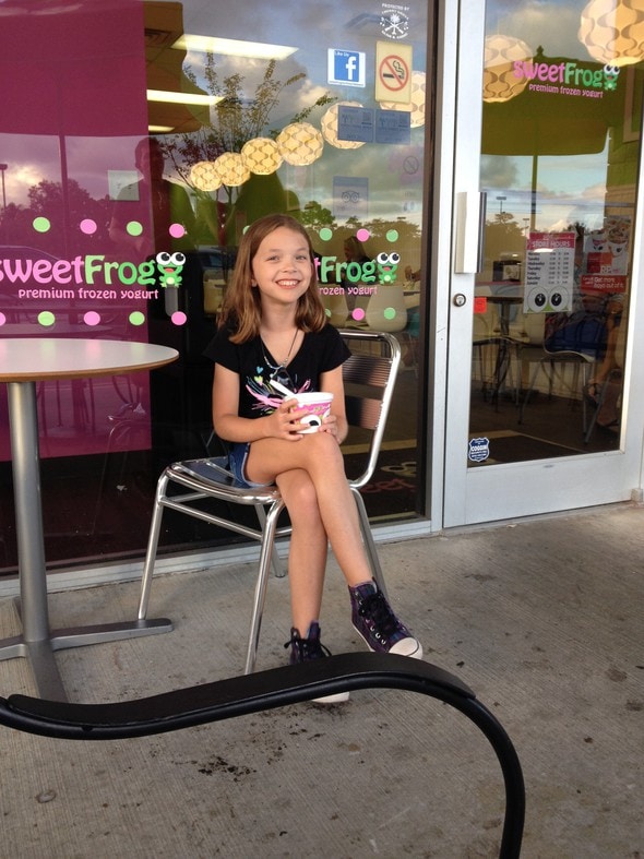 Zoe eating froyo.