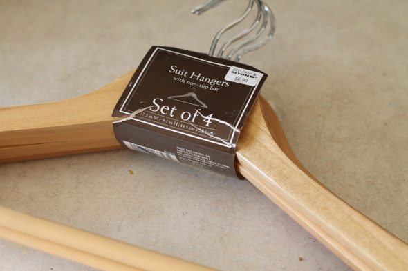 A package of wooden hangers.