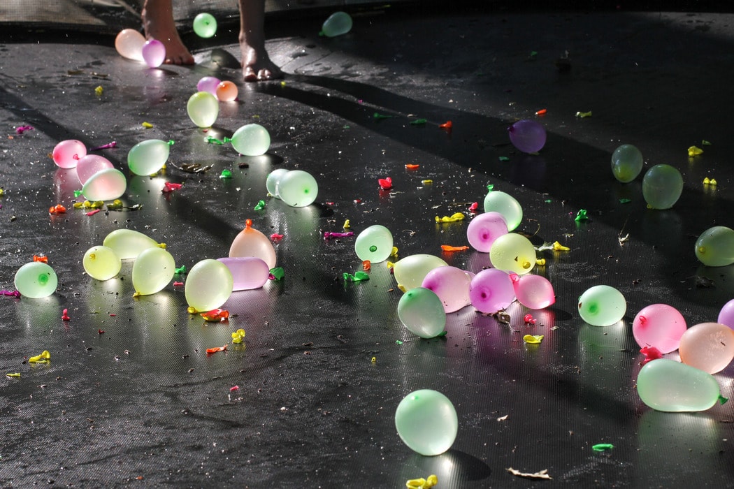 Water balloons on a trampoline.