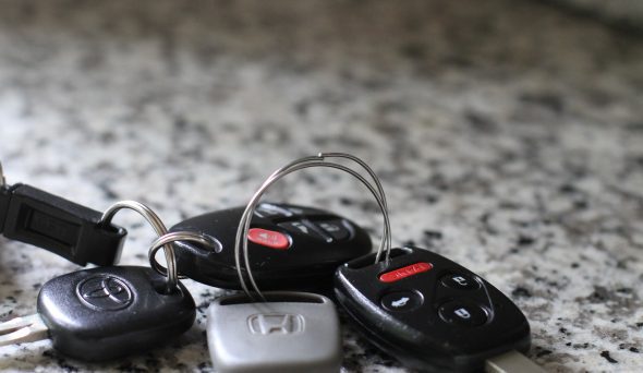 Toyota car keys on a countertop.