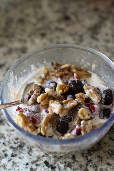 Oatmeal topped with berries and nuts.