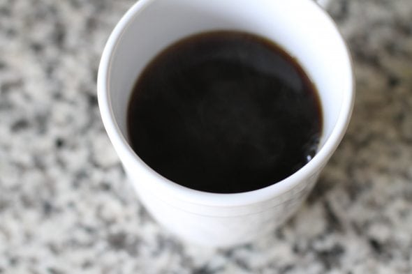 Black coffee in a white mug.