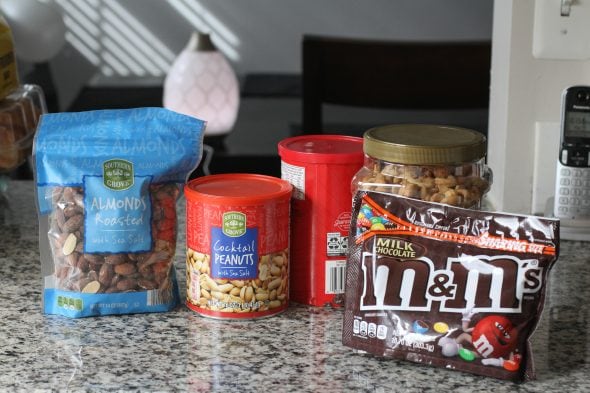 Trail mix ingredients on a countertop.