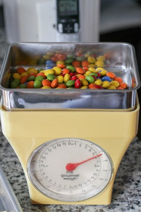 M&Ms in a kitchen scale.