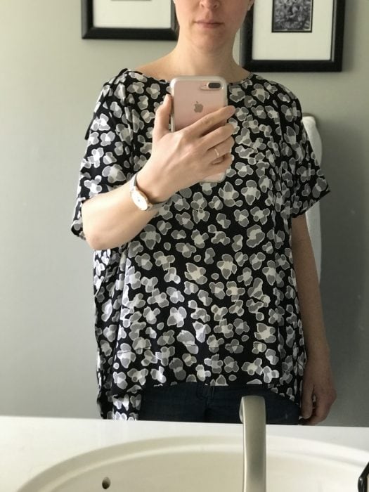 a boxy flowered shirt