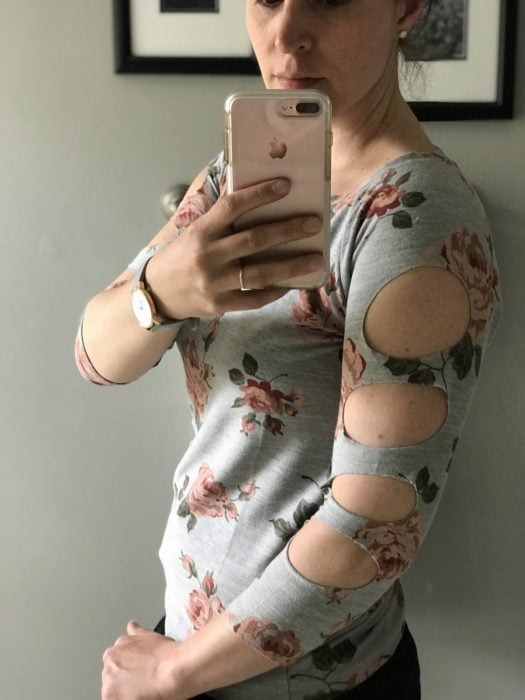 flowered shirt with holes in sleeves