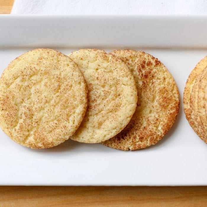 Snickerdoodles on a white plate.