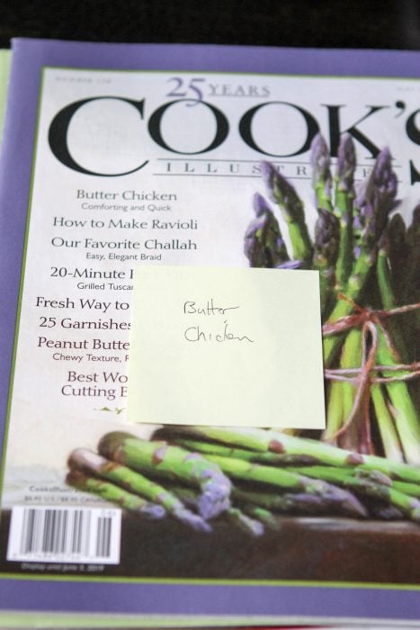 post it note on Cook's Illustrated magazine