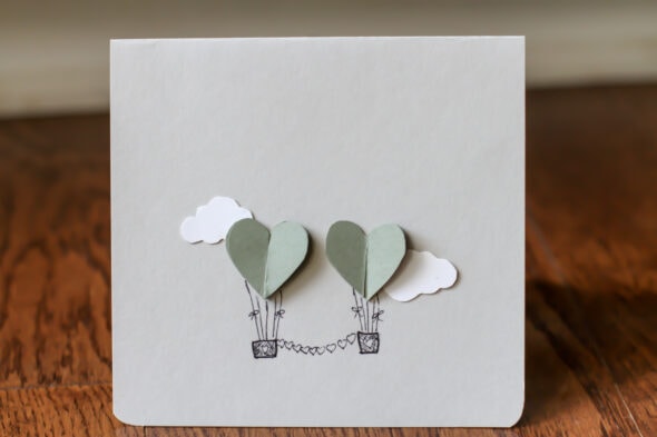 DIY anniversary card with hot air balloons on the front.