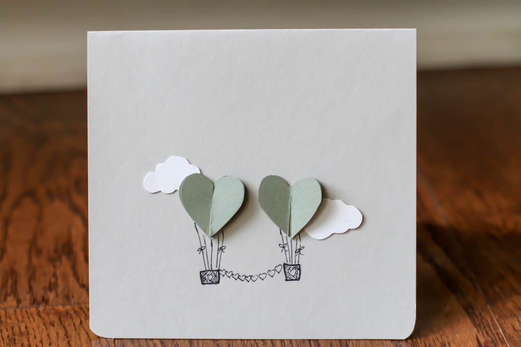 DIY anniversary card with hot air balloons on the front.
