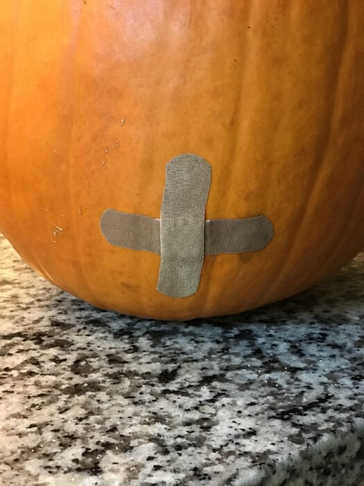 band aid on pumpkin