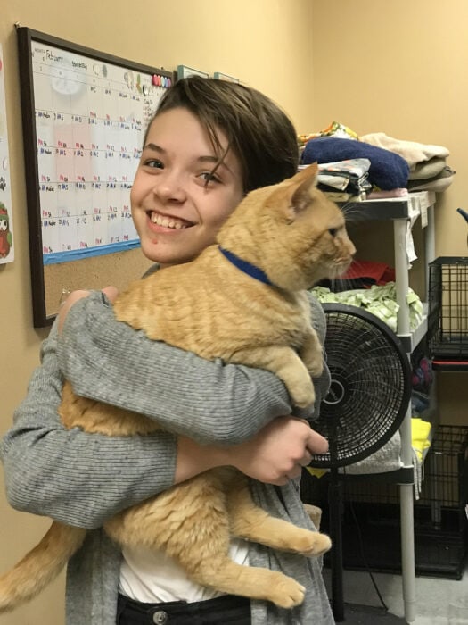 Zoe and a shelter cat