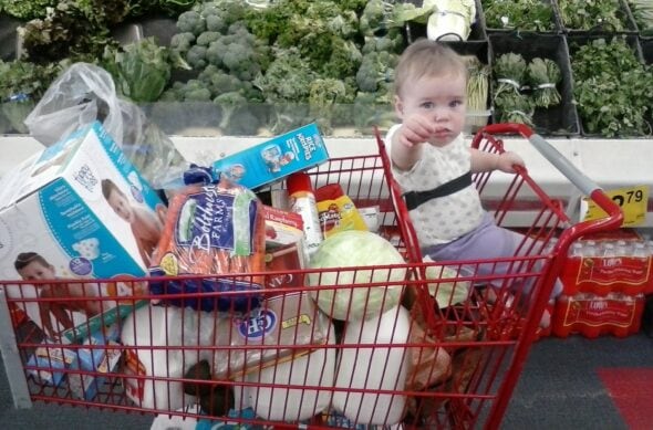 baby in grocery cart