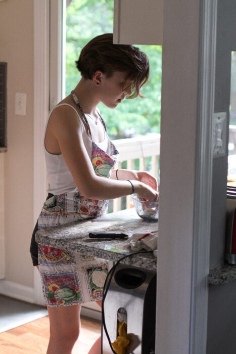 Zoe making bread