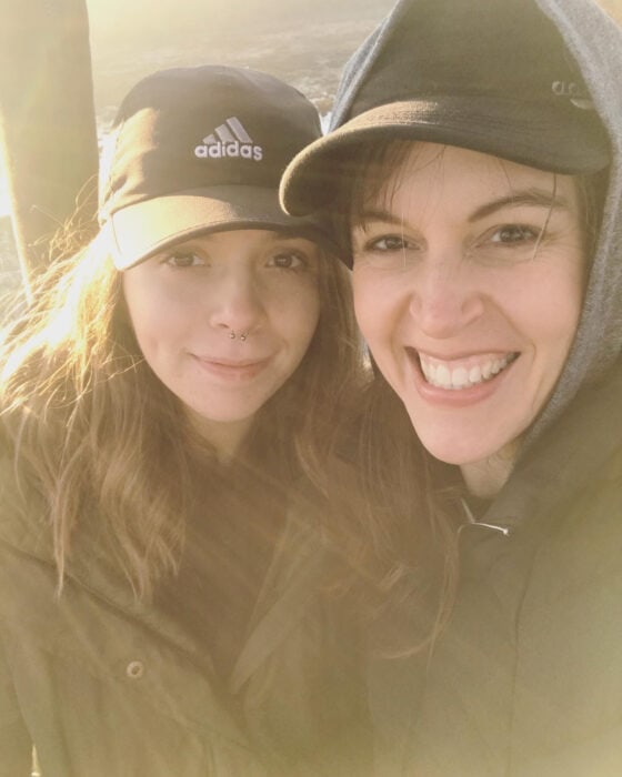 Kristen and Lisey with hats and jackets on.
