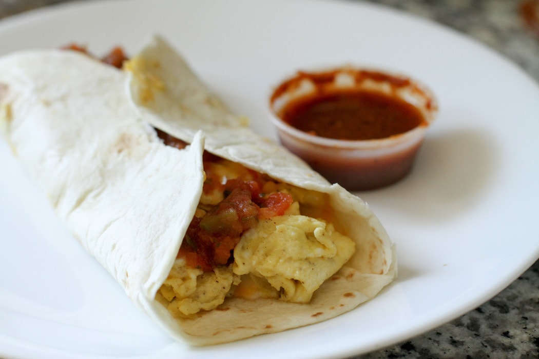 egg burrito with hot sauce
