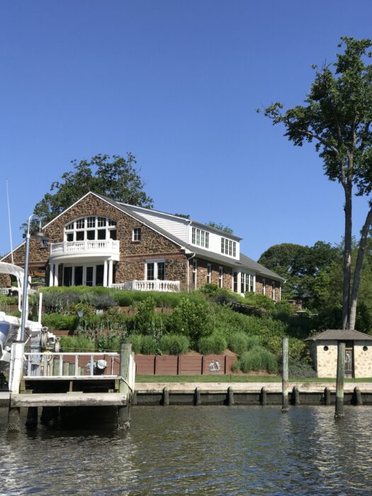 waterfront home on a sunny day.