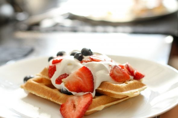 waffles with berries and whipped cream