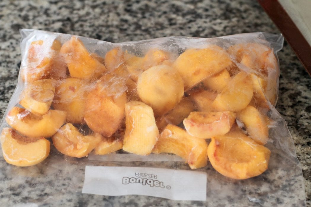 frozen peaches in a ziploc bag