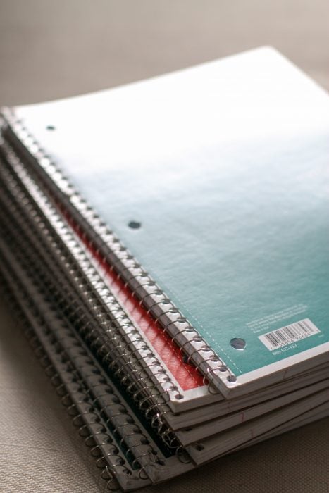 stack of spiral bound notebooks