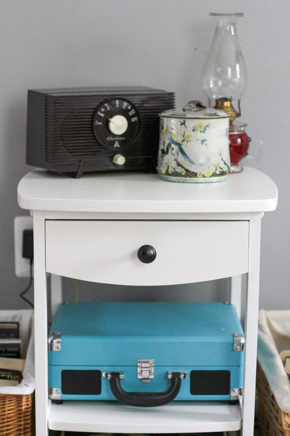 white painted nightstand with vintage accessories