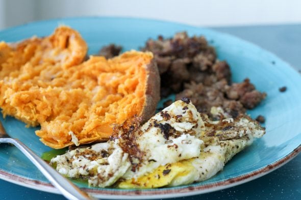 sweet potato, sausage, and fried eggs