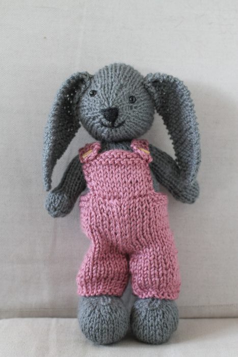 gray bunny with pink overalls