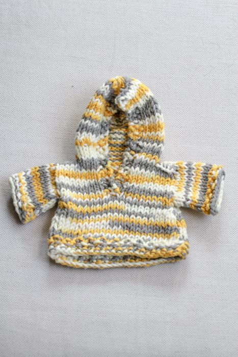 yellow knitted hoodie