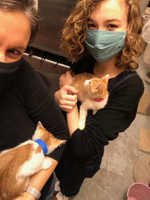 Kristen and Sonia holding kittens