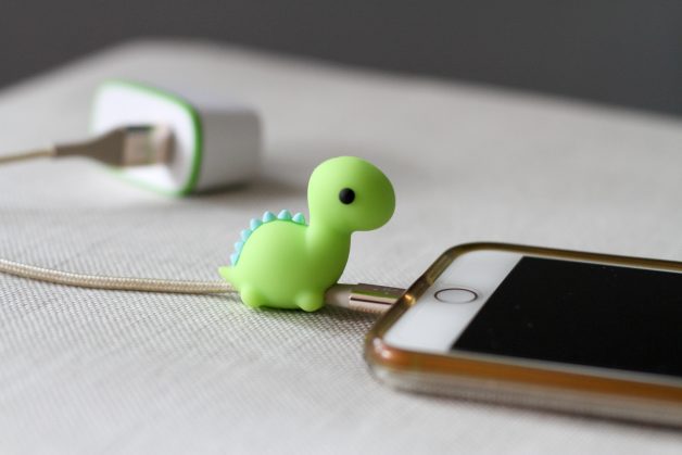 green dinosaur charging cable protector