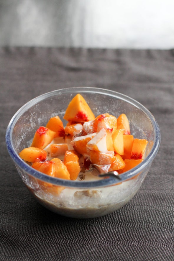 Oatmeal with frozen peaches.