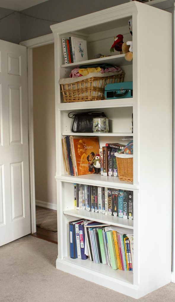 white painted bookshelf side view