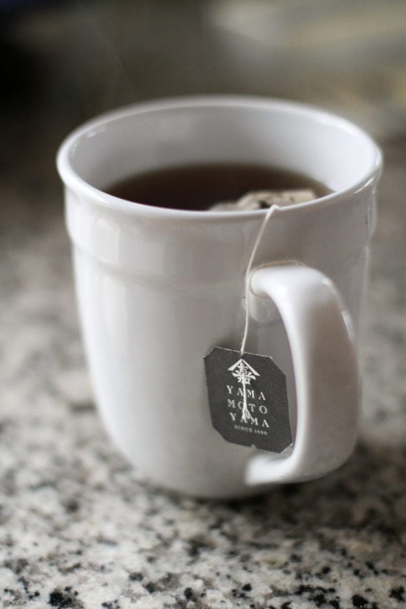 hot tea in a white mug.