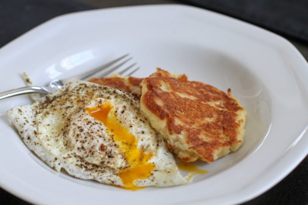 mashed potato patties with fried eggs.