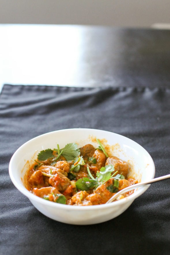 Sweet potato curry in a white bowl.