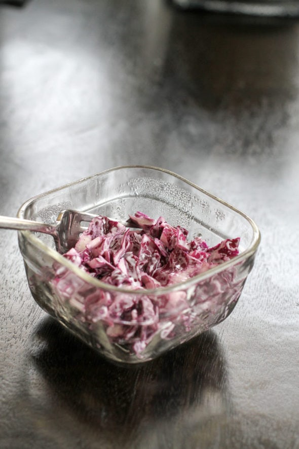 Shredded red cabbage with ranch dressing.