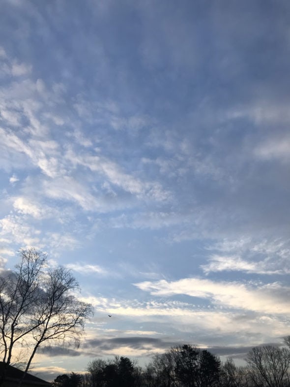 blue sky with tiny clouds