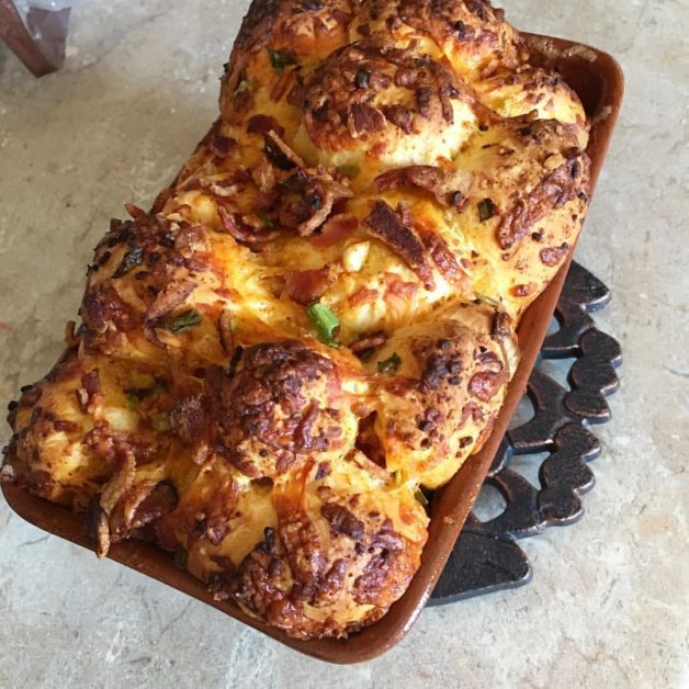 Jalapeno monkey bread in a pan.