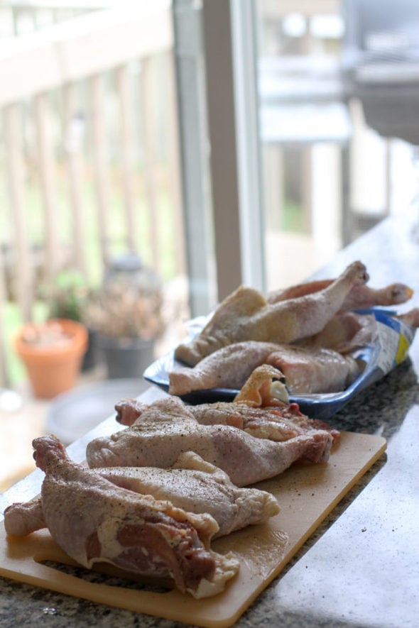 chicken leg quarters ready for grilling.
