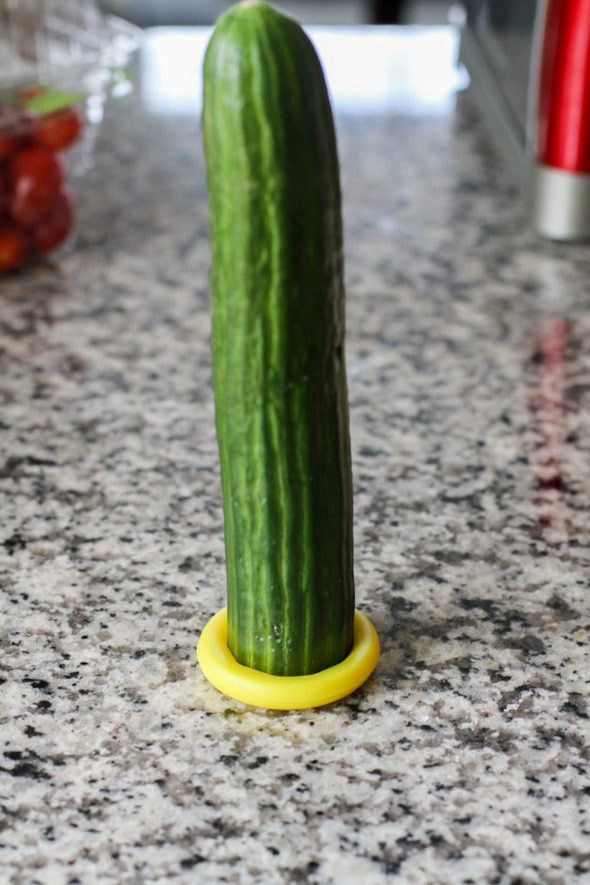 cucumber with a food hugger on the end.