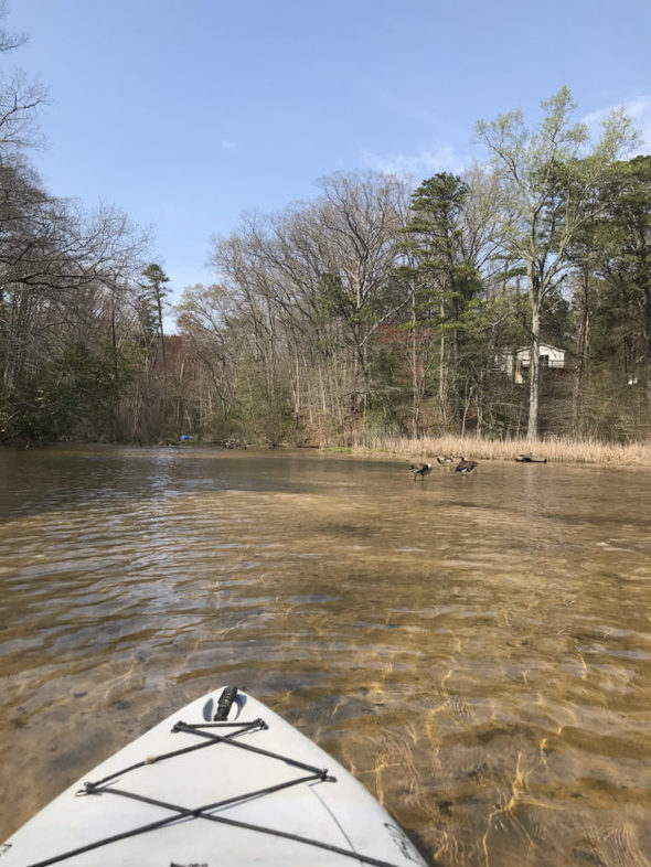 kayak tip in river.