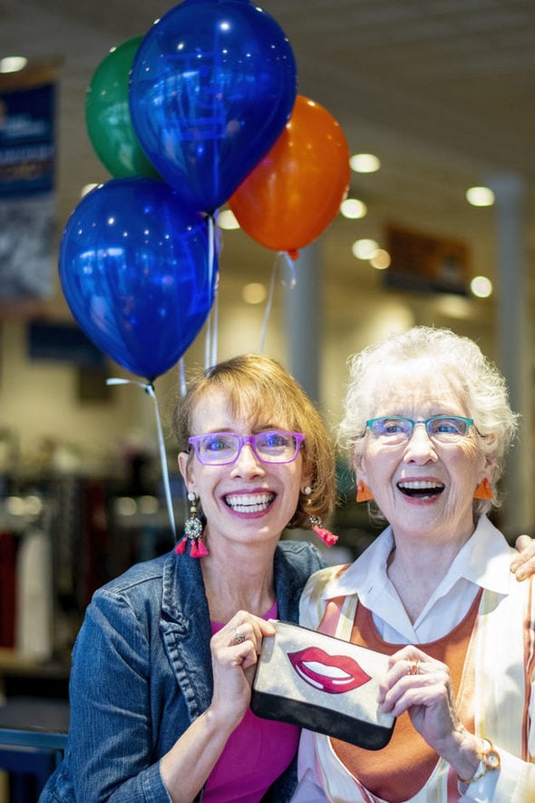 Jodie and her mom with balloons.