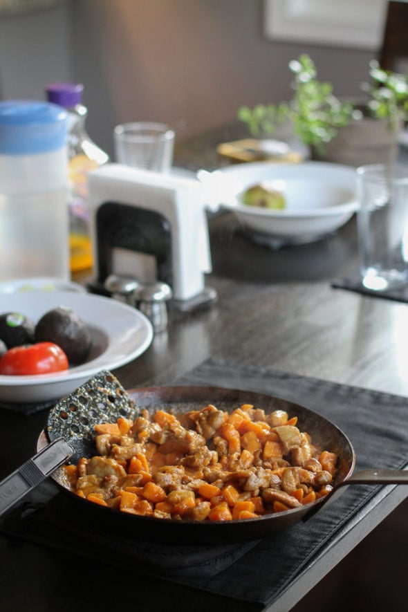 Thai red sweet potato and chicky curry in a skillet.