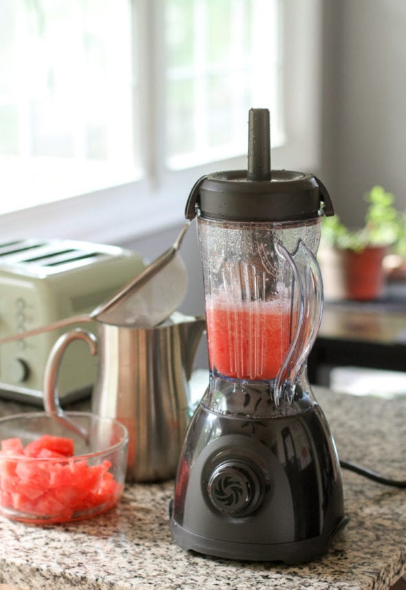 Vitamix One blender with watermelon inside.