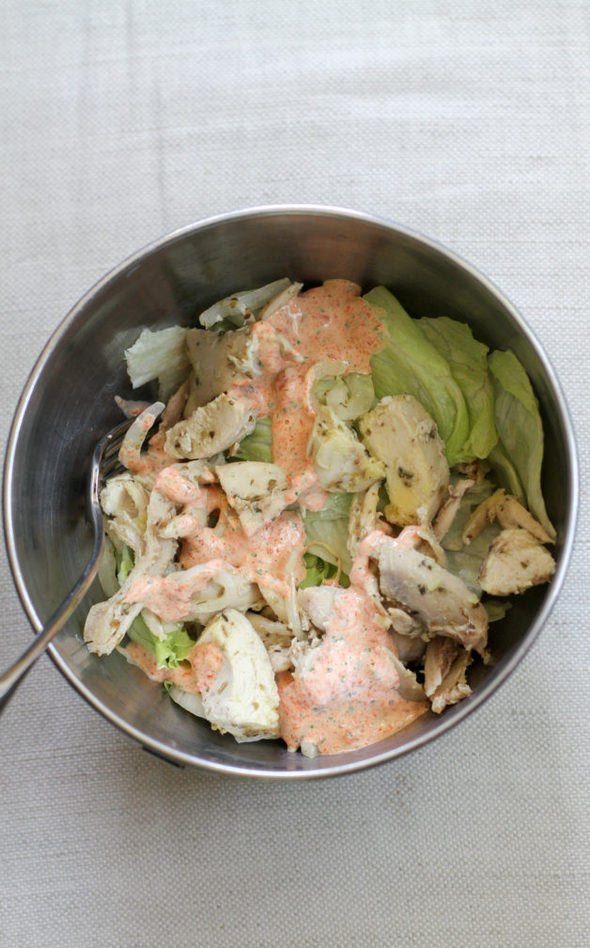 Brined chicken salad in a metal bowl.